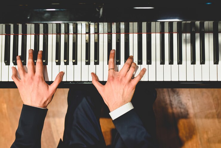 pianist performing piece grand piano with white black keys 47726 5040